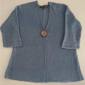 Blue sweater size S with snap button closure.